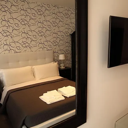 Couette-café Maison Flaminio 4*